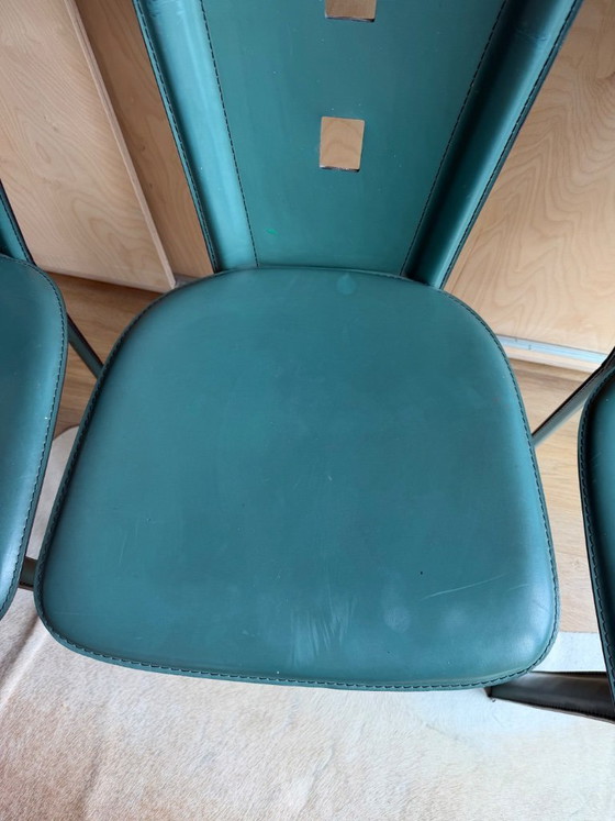 Image 1 of 4 Italiaanse design stoelen in teal/petrol kleur