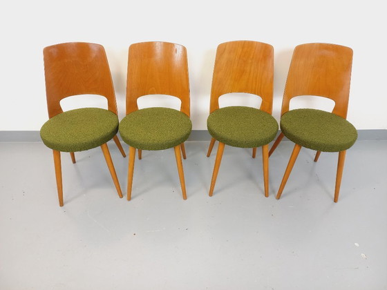 Image 1 of Set van 4 vintage Mondor stoelen van Baumann in hout en bouclé stof uit de jaren 60
