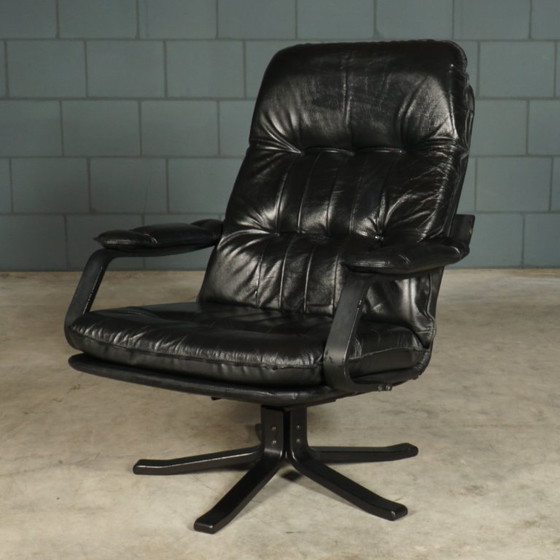 Image 1 of Vintage Unico draaifauteuil met hocker – jaren 70