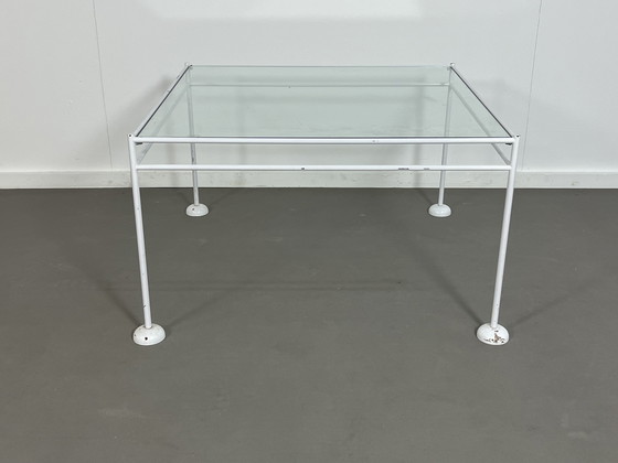 Image 1 of Vintage minimalist coffee table lacquered base with glass top