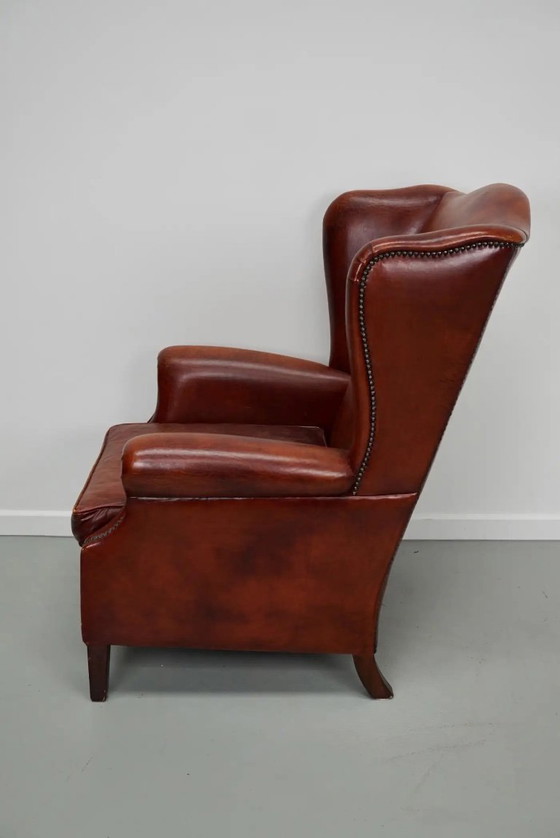 Image 1 of Vintage Nederlandse cognackleurige leren clubfauteuil met vleugelrug