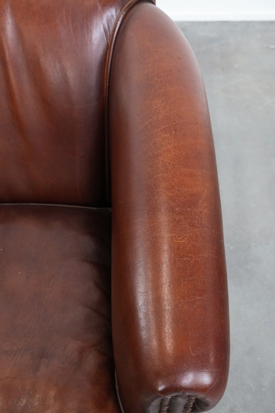 Image 1 of Vintage schapenleren clubfauteuil met siernagels