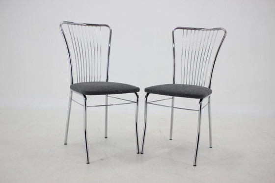 Image 1 of Set van zes Italiaanse eetkamerstoelen van chroom en bouclé, jaren 70.