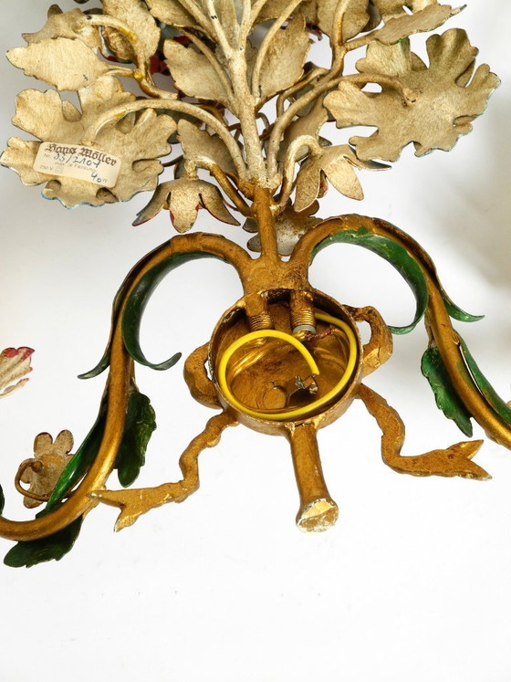 Image 1 of Une paire de magnifiques appliques murales en métal doré et peint à la main, datant des années 1960, signées Hans Möller.
