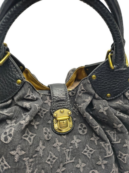 Sac hobo Louis Vuitton Surya Monogram en denim noir XL