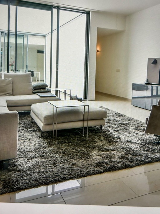 Tapis carré 3x3 mètres. Couleur gris