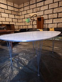 Fritz Hansen Superellips tafel wit laminaat met spanpoten