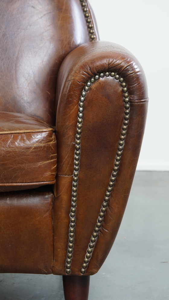 Image 1 of Rundleren design fauteuil/ armchair met ronde vormen en siernagels