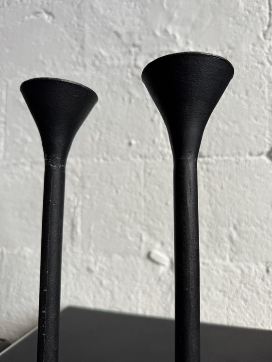 Image 1 of Black Memphis-style candlesticks from the 1980s