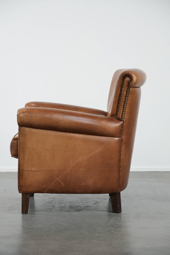 Image 1 of Vintage schapenleren fauteuil/ armchair met prachtige en warme kleuren