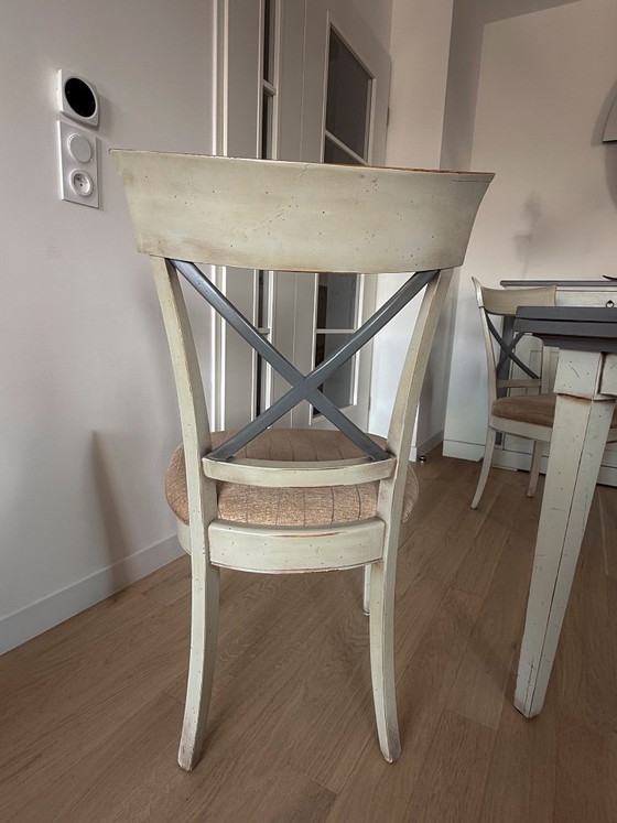 Image 1 of Handkerchief table with 4 leaves and 4 chairs