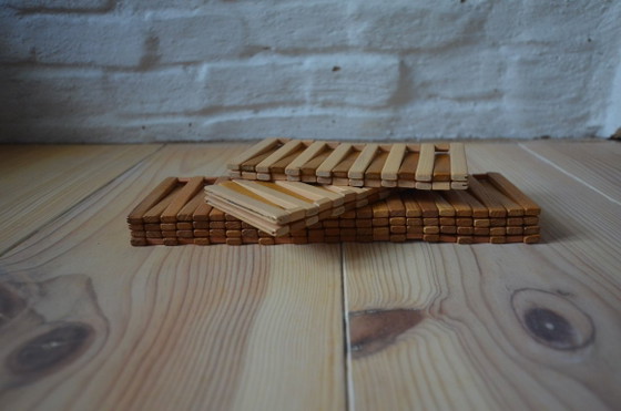 Image 1 of Vintage houten onderzetter, opvouwbaar