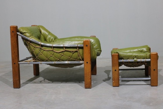 Image 1 of Sillón y otomana de cuero de Jean Gillon