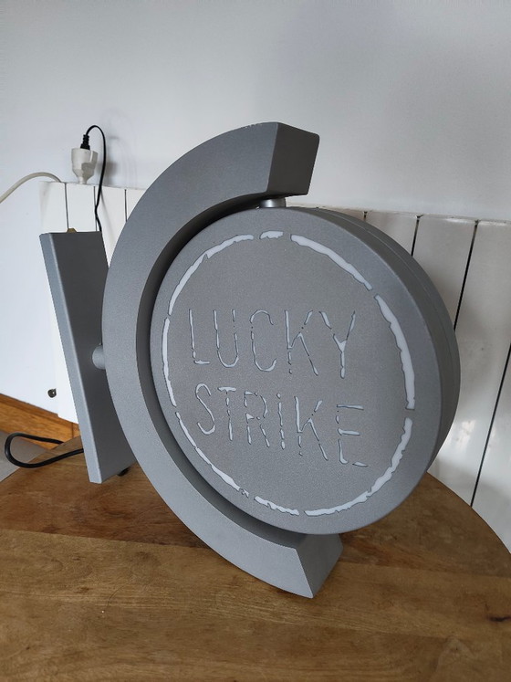 Image 1 of Vintage draaiend lichtreclamebord Lucky Strike