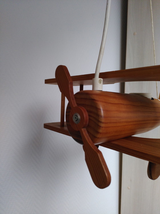 Image 1 of Suspension Avion en bois vintage 