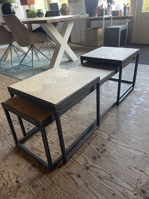 Set of 3 industrial oak herringbone coffee tables.