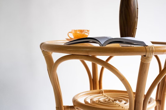 Image 1 of Elegant, round bamboo table with glass top