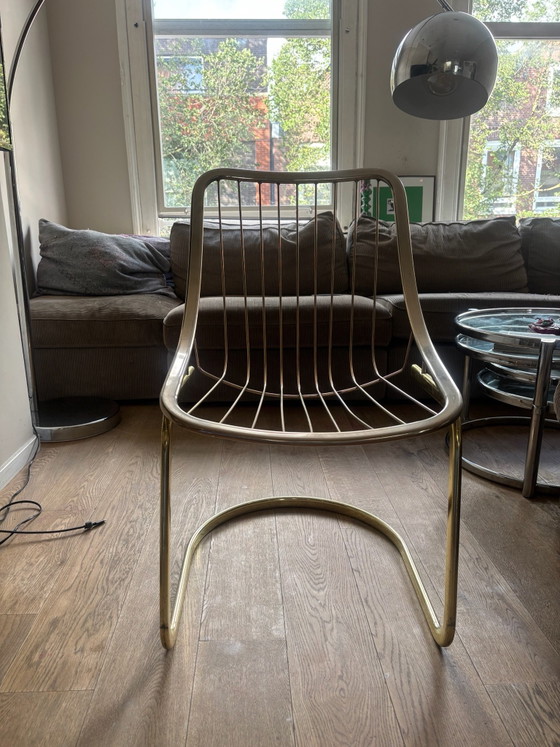 Vintage eethoek rookglas tafel 4 stoelen
RIMAGastone Rinaldi, Dining set, Metal, Gold (photo 5 of 6)