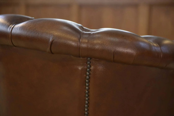 Pair of upholstered leather Club armchairs – Vintage (photo 13 of 14)