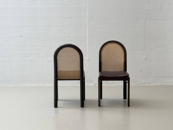 Image 1 of Set van 6 stoelen met rieten en lederen zittingen van Dietiker, jaren 80.