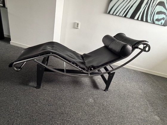 Image 1 of Corbusier lounge chair in black leather with a silver frame and black base