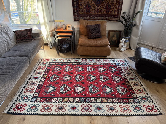 Image 1 of Kilim caucasico d'epoca con motivo grafico di animali (216 × 160 cm) ca. 1950