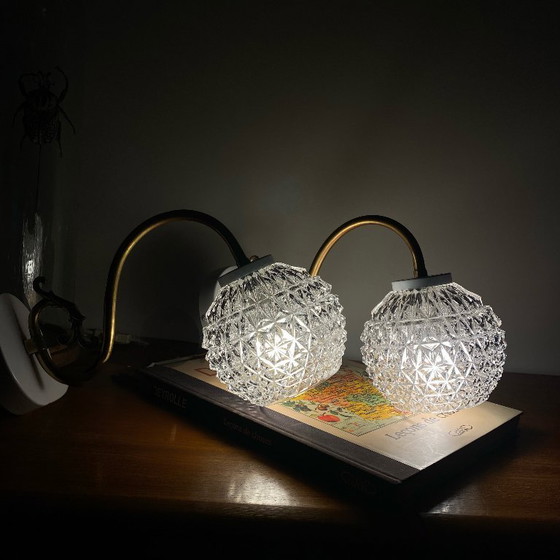 Image 1 of Large pair of brass gooseneck wall lights, clear glass globes, white metal rosettes