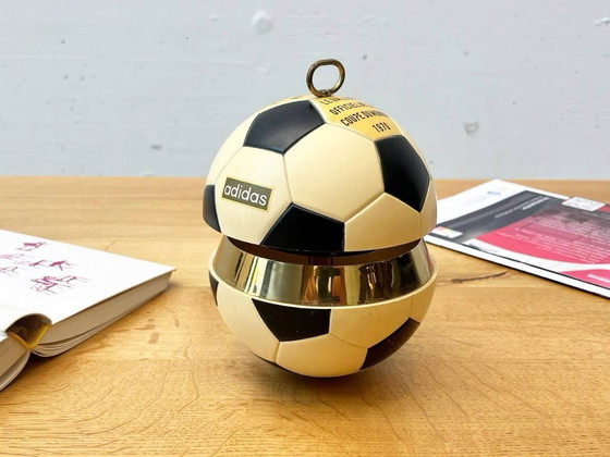 Image 1 of Vintage Adidas cigarette dispenser from the 1970s