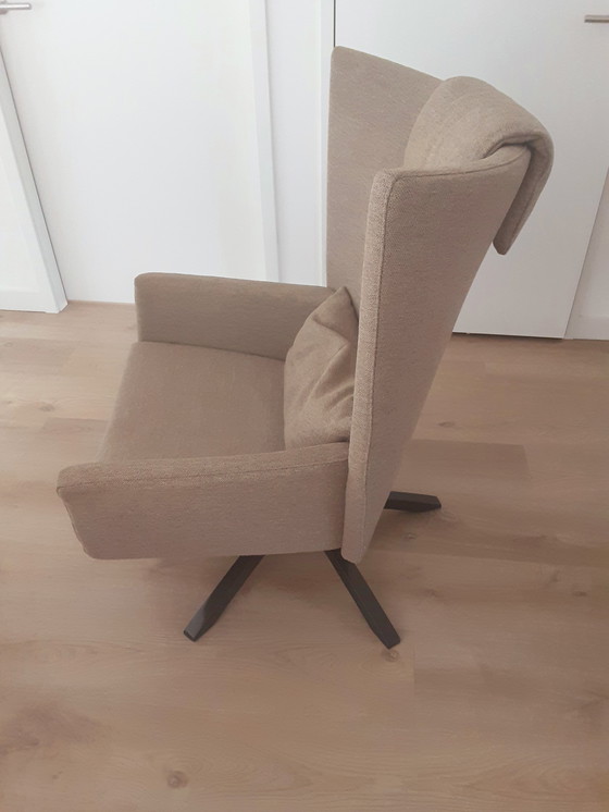 Image 1 of Design on Stock draaifauteuil  Maua met hocker 