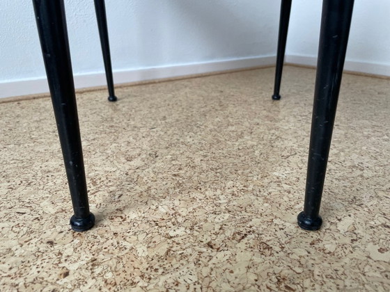 Image 1 of Een paar vintage zwarte leren Italiaanse design eetkamerstoelen (Fasem S44)