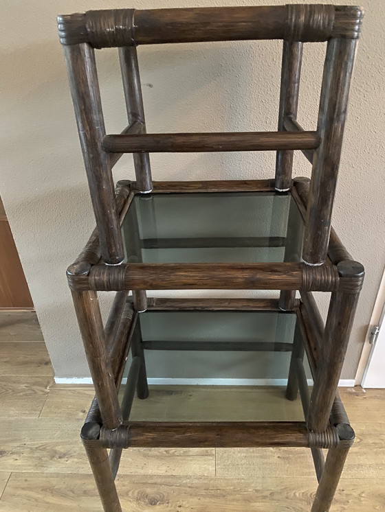 Image 1 of Vintage rattan bamboo nesting tables mimeset smoked glass