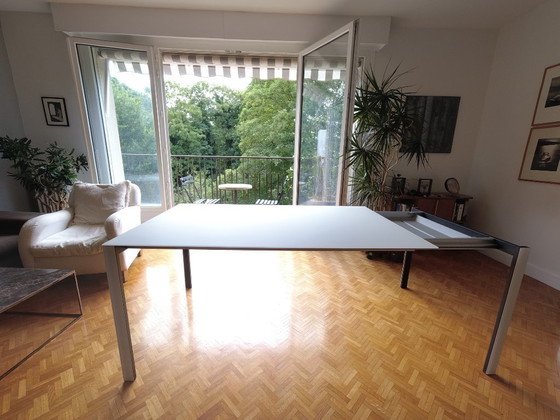 Image 1 of Mesa extensible Thin-K de cristal y acero, marca italiana Kristalia.