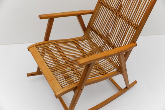 Image 1 of Sedia a dondolo in legno e rattan della Deutsche Werkstätten Hellerau, anni '60