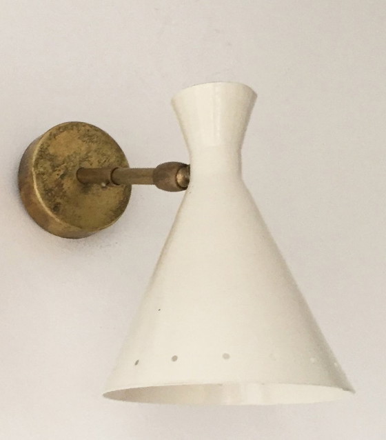 Image 1 of Set van drie Italiaanse design wandlampen uit de jaren 50.