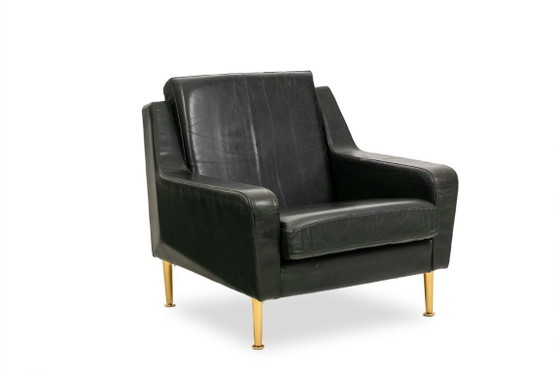 Image 1 of Airborne. Een paar groene leren fauteuils. Jaren 50.