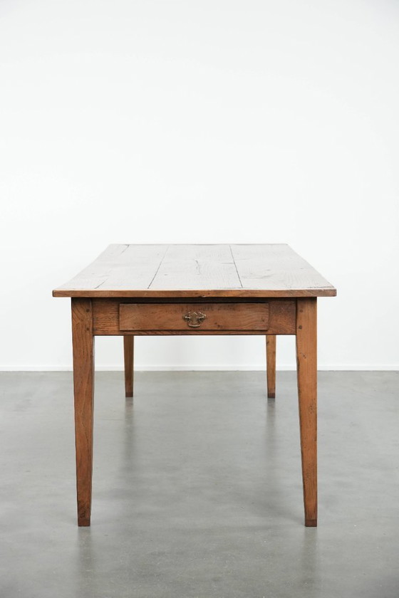 Image 1 of Antique French oak farmhouse dining table for 6 to 8 people with three drawers