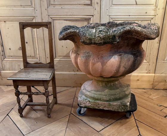 Image 1 of paar terracotta potdeksels