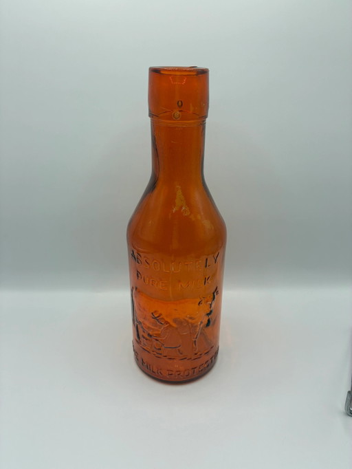 Antike bernsteinfarbene Milchflasche „Absolut reine Milch“ – Der Milchbeschützer – um 1900 (photo 2 of 6)