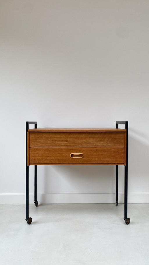 Vintage teak wooden cabinet on wheels