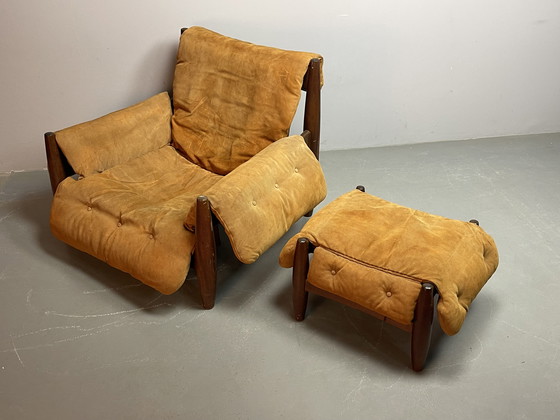Image 1 of Sillón y reposapiés de mediados de siglo en color coñac, Sergio Rodríguez, años 70.