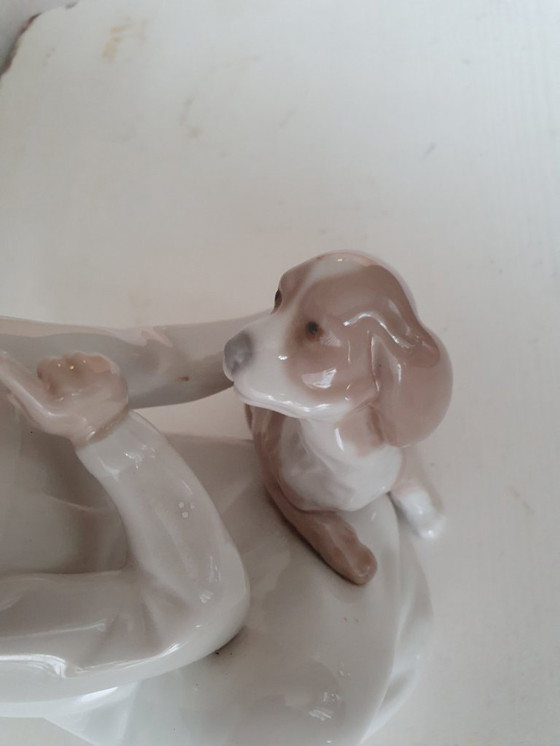 Image 1 of Authentic Lladro "Boy with dog" - porcelain figurine 20 cm