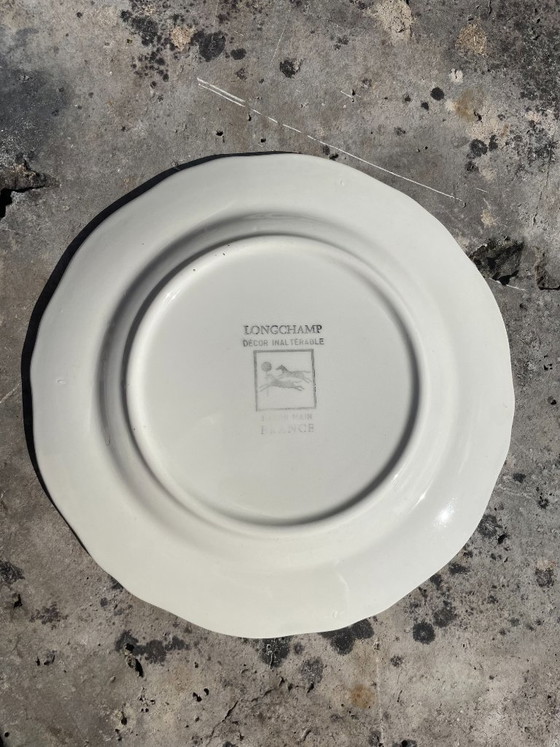 Image 1 of Par de platos Longchamp con diseño de viñedo – Clos Vougeot y Dom Pérignon