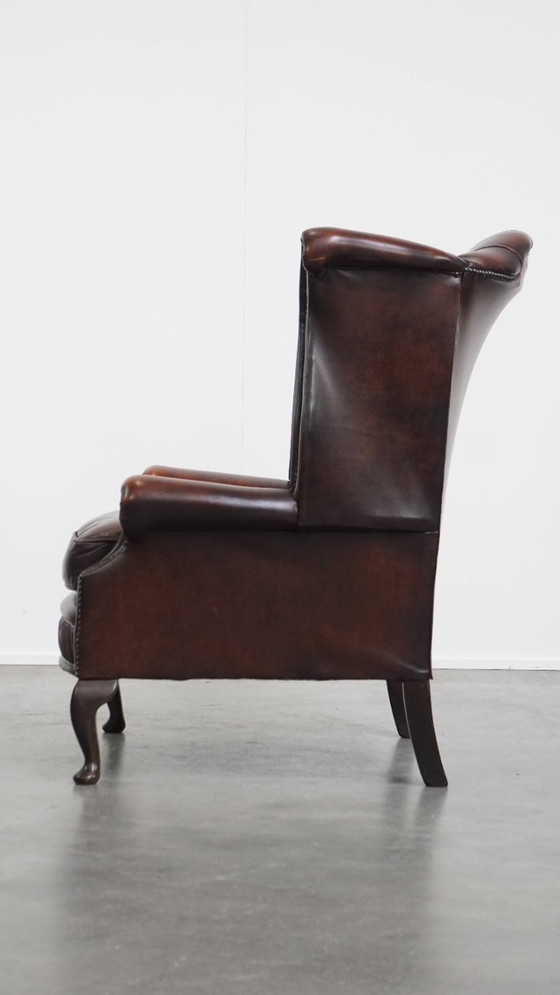 Image 1 of Bruine rundleren chesterfield oorfauteuil