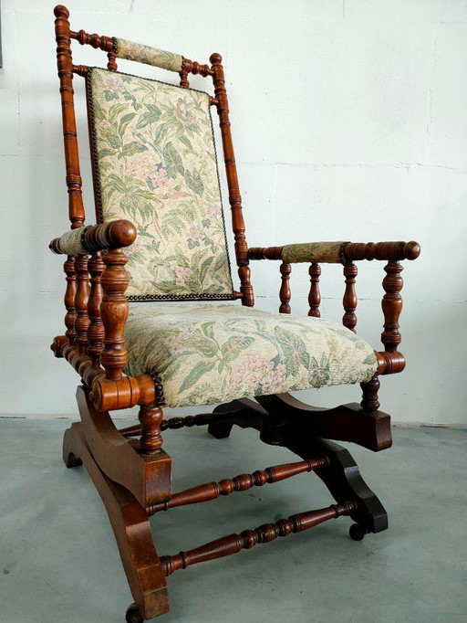 Sedia a dondolo antica vintage con meccanismo a bobina