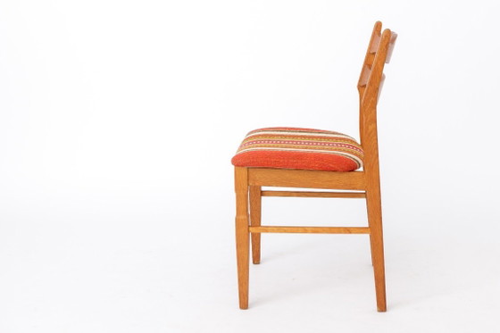 Image 1 of Ensemble de 4 chaises de salle à manger en chêne Henning Kjærnulf | Danois Moderne | EG Mobilier | années 1970