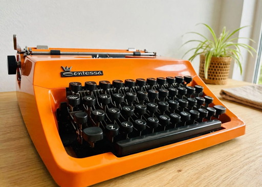Orangene Adler Contessa de Luxe Schreibmaschine