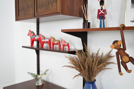 Modulaire stellingen van palissanderfineer van Poul Cadovius, Denemarken, jaren 70. – Wandkast, Mdf (photo 16 of 27)