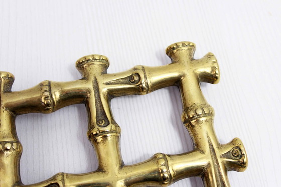 Image 1 of Onderzetter van imitatie bamboe en messing