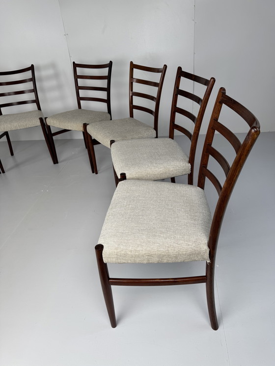 Image 1 of Set mit 8 Esszimmerstühlen aus Palisanderholz von Johannes Andersen – Schou Andersen Møbelfabrik