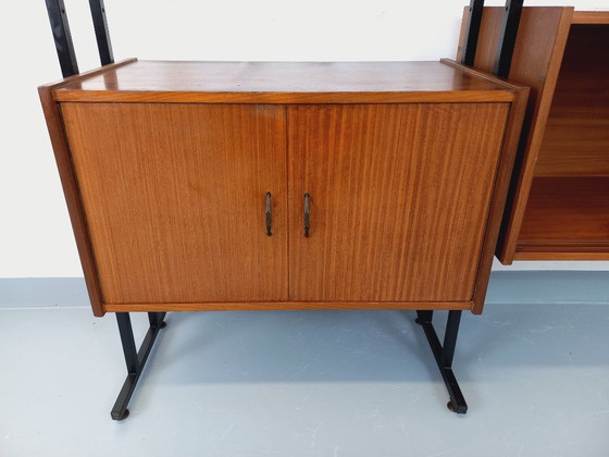 Image 1 of Vintage Italian double modular bookcase in teak and metal from the 1960s